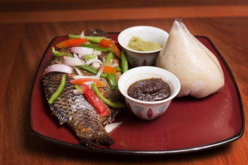 Banku with Chofi/ Tilapia  served with pepper & shito (Medium)